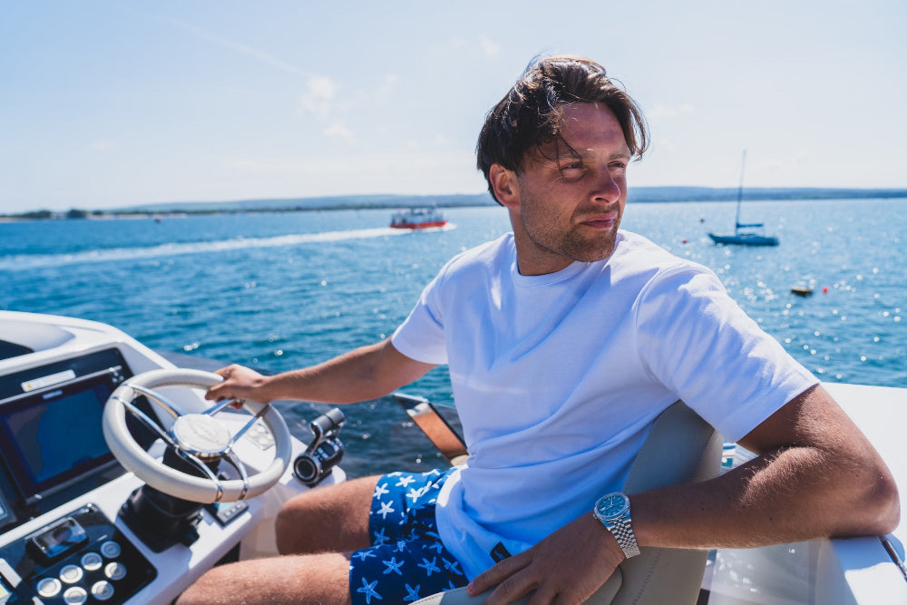 Casey O'Gorman Modelling James Cromwell London ss26 Collection on a boat